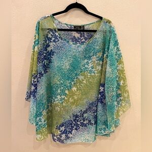 Size 3X semi sheer blouse excellent condition